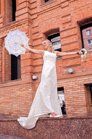 the young beautiful bride on the natureの写真素材
