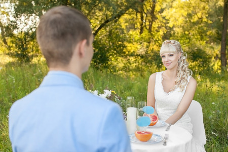 young beautiful bride on the nature in summerの写真素材