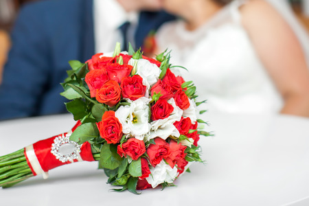 The bride holds the beautiful wedding bouquetの写真素材