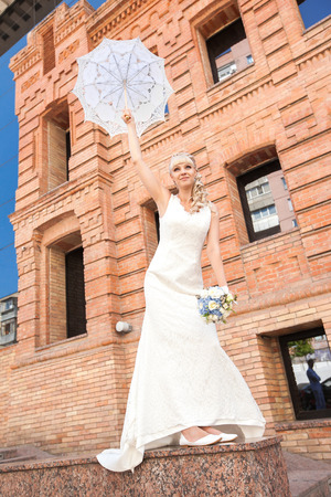 the young beautiful bride on the natureの写真素材