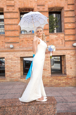 the young beautiful bride on the natureの写真素材