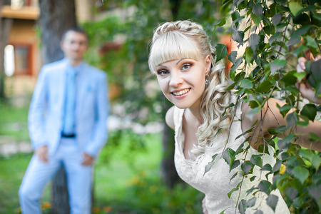 the young beautiful bride on the natureの写真素材