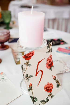 the special evening candles are on the tableの写真素材