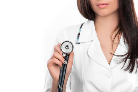 female Doctor with a stethoscope in the handの写真素材