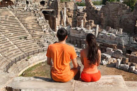 tourists at Ruins of the ancient amphitheater in Sideの写真素材