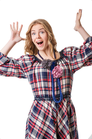 attractive beautiful blonde girl in checked dress. girl enthusiastically exclaimedの写真素材