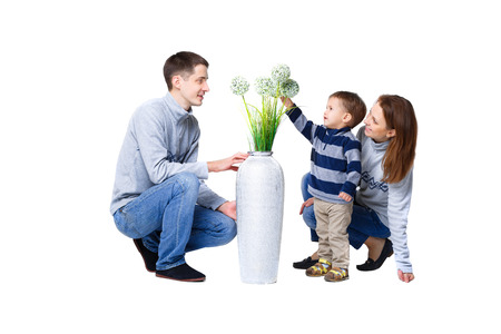 parents playing with son. mommy, daddy and little baby boy. happy familyの写真素材