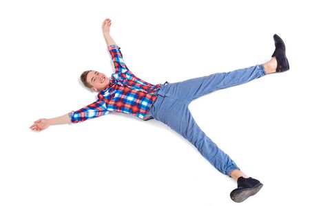 attractive young cheerful man in checked shirt on white backgroundの写真素材