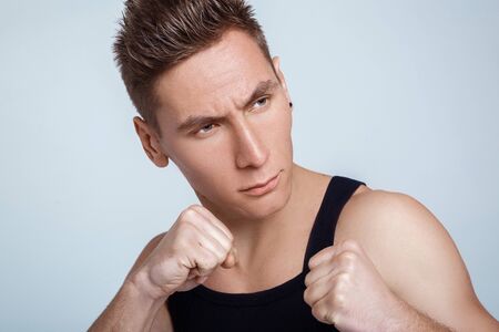 portrait of a young athlete. an attractive man  fightsの写真素材