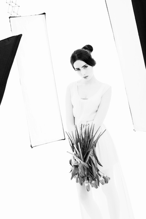 beautiful woman posing in Studio. Studio black and white photographyの写真素材