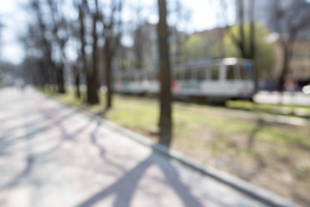 Blurred park background. blurry green grass. spring day. bokehの写真素材