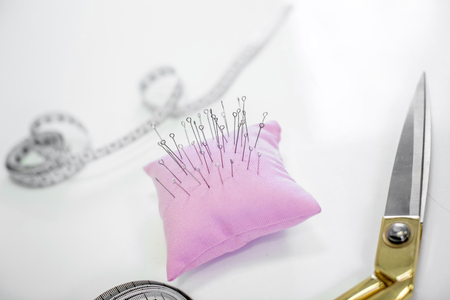 Set of sewing scissors, measuring tape, fabric and pins for sewing and needlework . sewing kitの写真素材