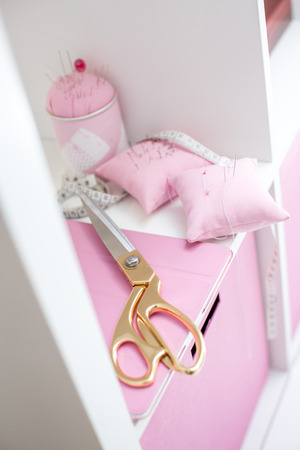 Set of sewing scissors, measuring tape, fabric and pins for sewing and needlework . sewing kitの写真素材