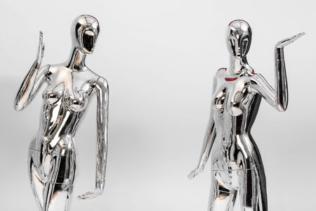 many fashion shiny female mannequins for clothes. Metallic manneの写真素材
