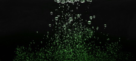 bubbles in water on dark background. waterdropsの写真素材