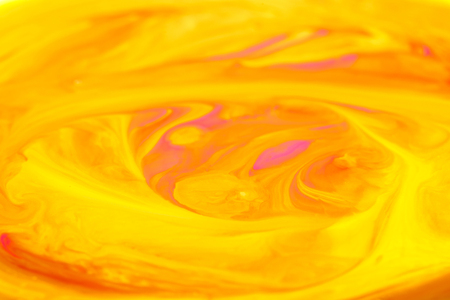 abstract background. red and yellow mixed acrylic paints.の写真素材