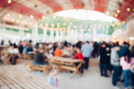blur people picnic in public Park with family or friends. Blurred picnic backgroundの写真素材
