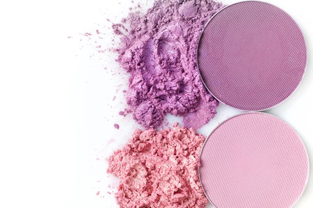 Crushed eye shadow and round eye shadow  isolated on white backgroundの写真素材