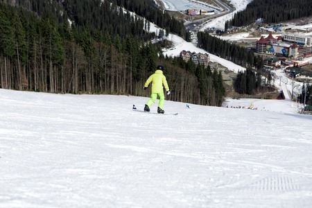 BUKOVEL, UKRAINE, March 04, 2017: snowboarder on a training slope in Bukovelのeditorial素材