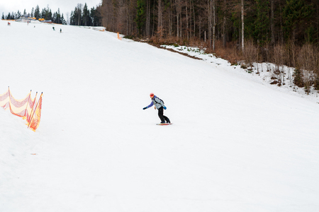 BUKOVEL, UKRAINE, March 06, 2017: snowboarder on a training slope in Bukovelのeditorial素材