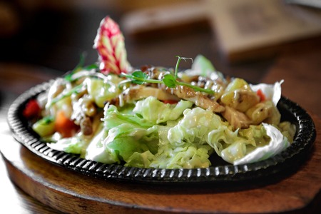 salad in a frying panの写真素材