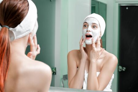 woman with a mask on her faceの写真素材