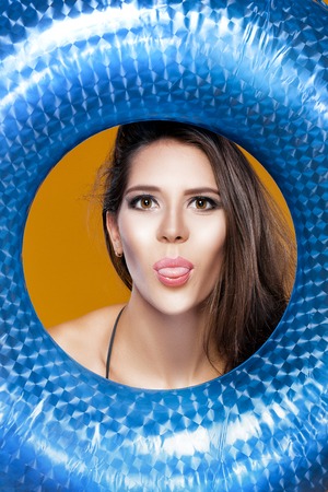 woman in bikini with rubber  ringの写真素材