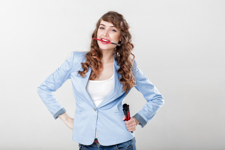 make-up artist holding makeup brushの写真素材