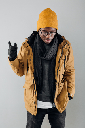 African-American man posing on gray backgroundの写真素材