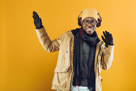 African-American man in headphones listening to musicの写真素材