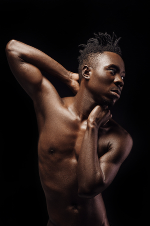 portrait of African-American man on black backgroundの写真素材
