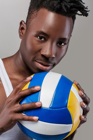 African-American man with volleyballの写真素材