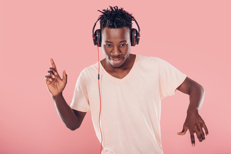 African-American man in headphones listening to musicの写真素材