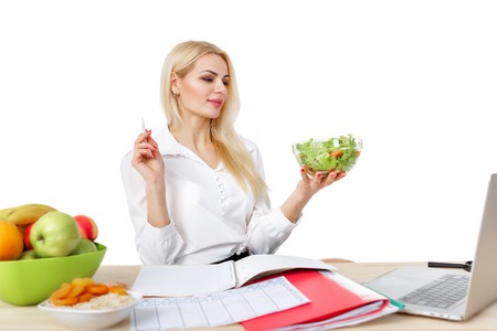 dietician making a diet of fruits and vegetablesの写真素材
