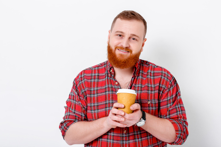 man drinks coffee to wake upの写真素材