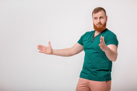 man showing large size of somethingの写真素材