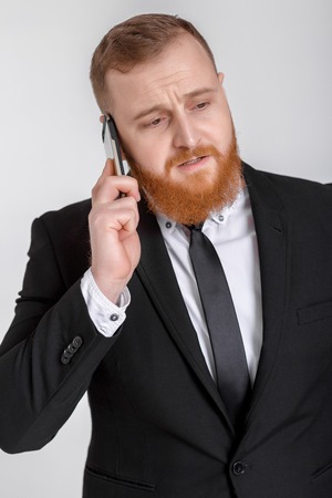 Business man talking on the phoneの写真素材