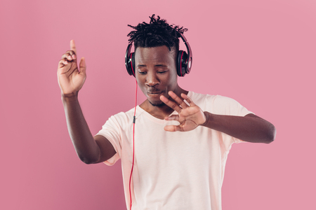 African-American man in headphones listening to musicの写真素材