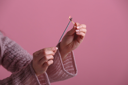 Female hands holding bengal light.の写真素材