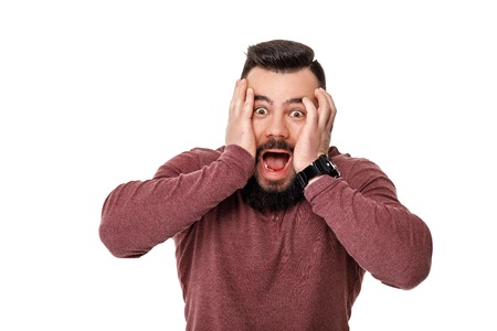 sad bearded football fan in capの写真素材