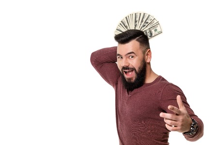 man with beard holding moneyの写真素材