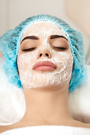 beautiful young woman with face maskの写真素材
