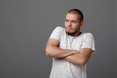 portrait of cautious young manの写真素材