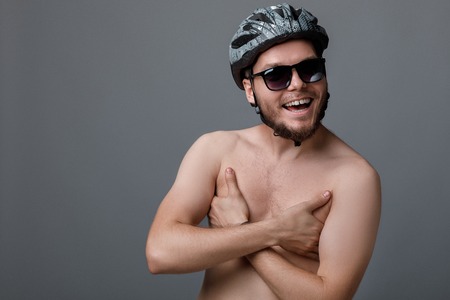 the funny portrait of the young cyclistの写真素材
