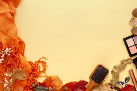 Fashion female accessories Set. autumn leaves, sunglasses,  and cosmeticsの写真素材