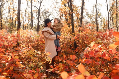 mother and little daughter girl having funの写真素材