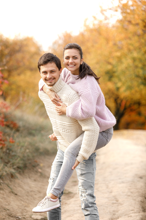 Couple in love in the autumn leavesの写真素材