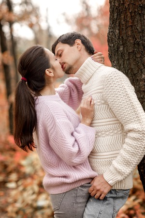 Couple in love in the autumn leavesの写真素材