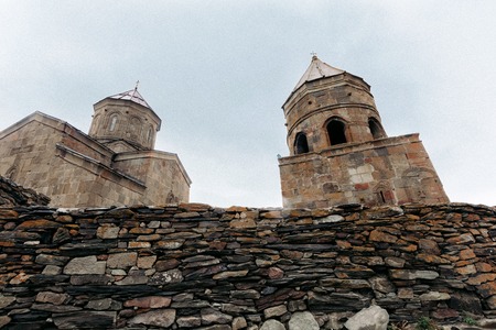 Trinity Church of Gerget on a rainy autumn day, Georgiaの写真素材