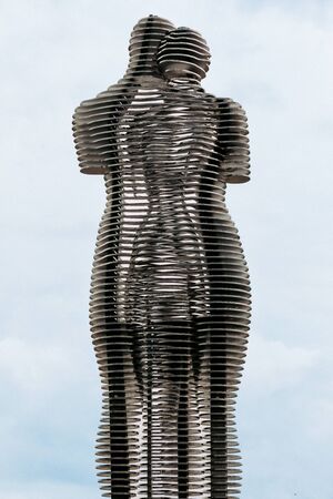 BATUMI, GEORGIA - September 10, 2018: Moving sculpture "Ali and Nino" , Alphabet tower and ferris wheel in Batumi, Georgiaのeditorial素材